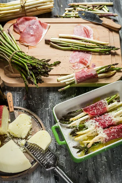 Preparations for the casserole with asparagus and cheese — Stock Photo, Image