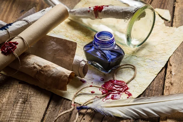 Vintage desk full of old scrolls scribe — Stock Photo, Image