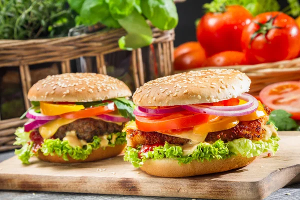 Closeup of two homemade hamburgers — Stock Photo, Image