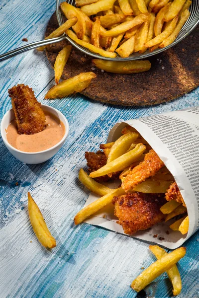 Closeup of homemade Fish & Chips in newspaper — Stock Photo, Image