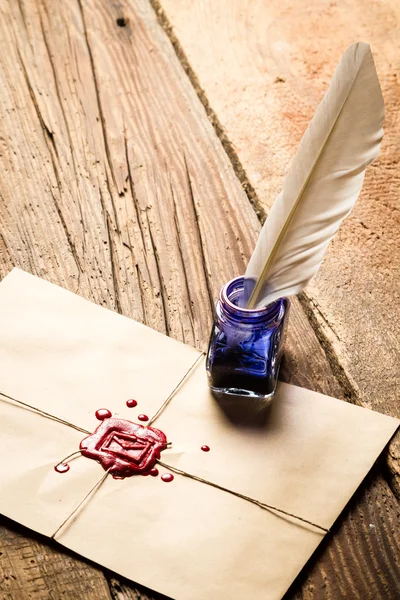 Old scrolls and candles are the old scribe's workplace — Stock Photo, Image