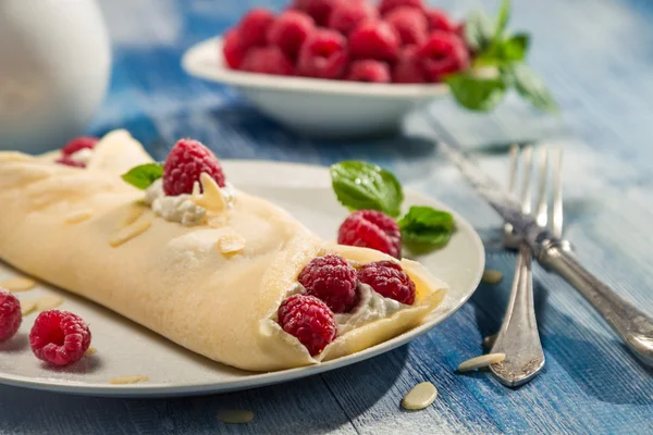 Close-up van pannenkoeken met framboos — Stockfoto