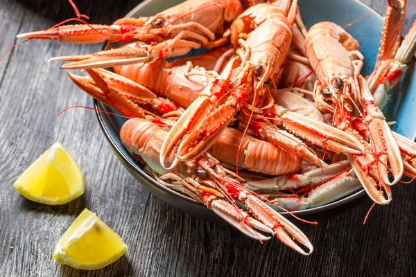 Lobster with lemon as a seafood dish — Stock Photo, Image