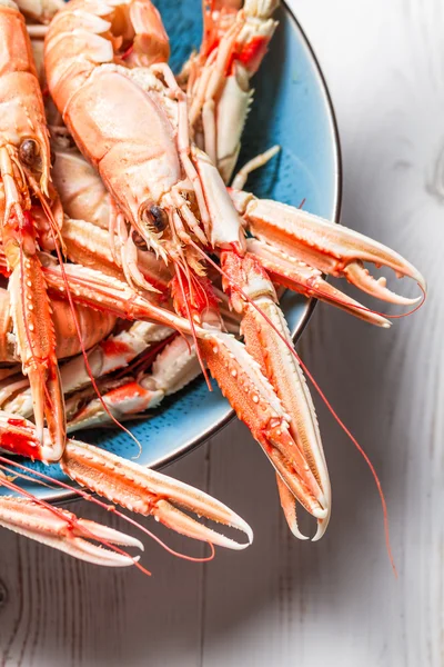 Lobster with lemon as a seafood dish — Stock Photo, Image