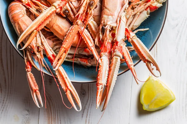 Lobster with lemon as a seafood dish — Stock Photo, Image