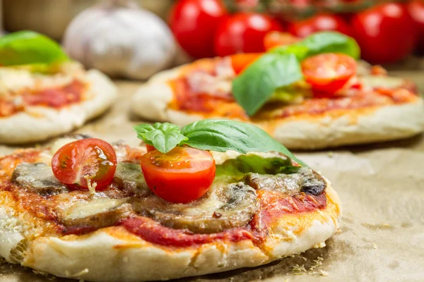 Freshly baked mini pizzas — Stock Photo, Image