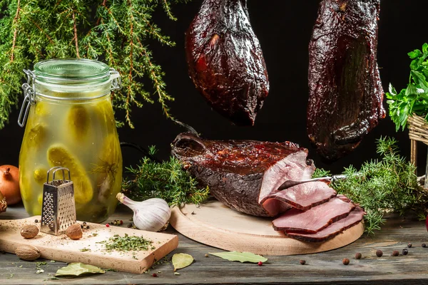 Freshly smoked ham in a rural pantry — Stock Photo, Image