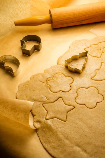 Cutting of different shapes of gingerbread cookies — Stock Photo, Image