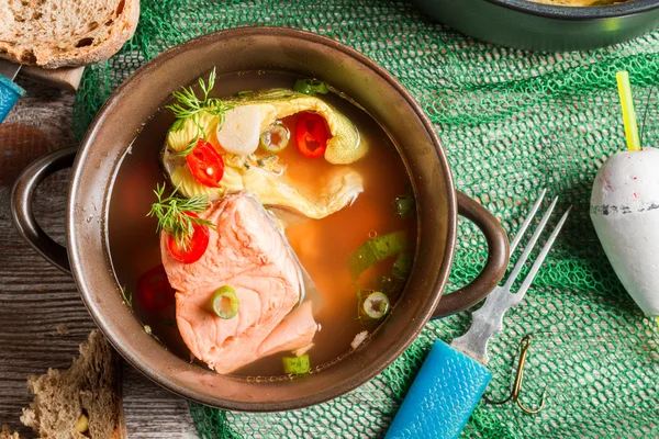 Fish soup spiced with dill and chilli pepper — Stock Photo, Image