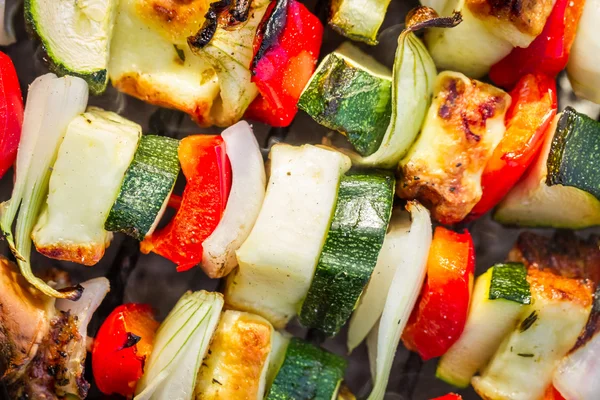 Closeup of hot skewers on the grate — Stock Photo, Image