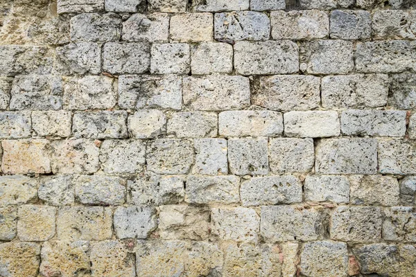 Medieval wall built of ancient stone — Stock Photo, Image