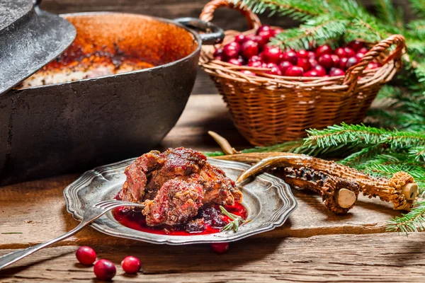 Venison with cranberry sauce and rosemary — Stock Photo, Image