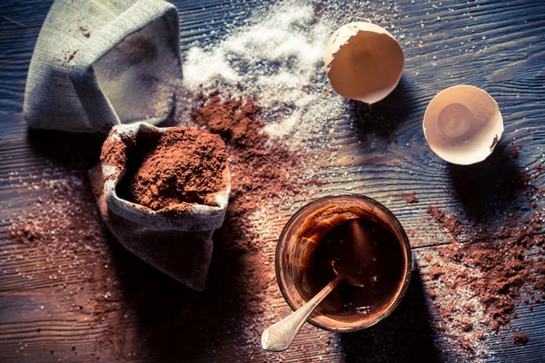 Taste of childhood, egg yolk with sugar and cocoa — Stock Photo, Image