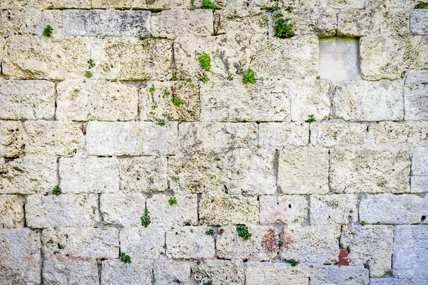 White stone wall built of old stone — Stock Photo, Image