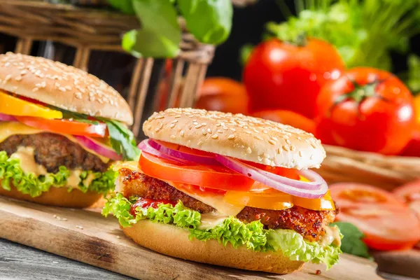 Homemade burger and a cold beer — Stock Photo, Image