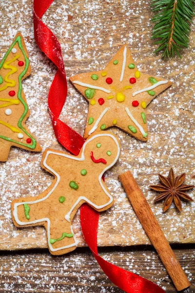 Closeup on the Gingerbread Man on a red ribbon — Stock Photo, Image