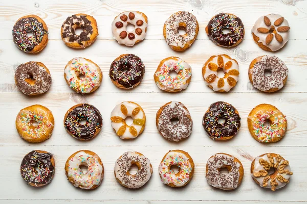 Large group of colorfully decorated donuts — Stock Photo, Image