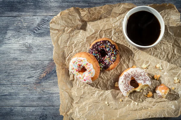 Donuts with coffee for a break — Stock Photo, Image