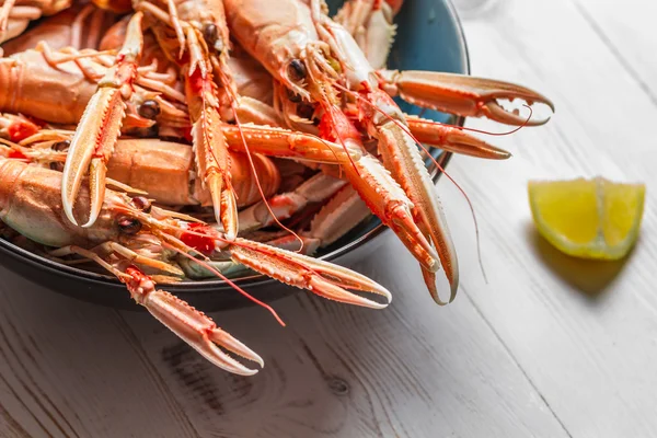 Lobster with lemon as a seafood dish — Stock Photo, Image