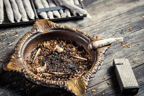 Ashtray and handmade cigarettes — Stock Photo, Image