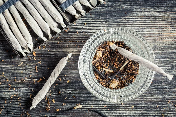 Closeup of cigarettes and ashtray — Stock Photo, Image