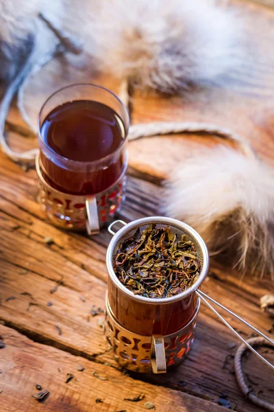 Warming tea served in old-fashioned — Stock Photo, Image