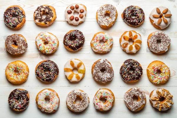 Large group of colorfully decorated donuts — Stock Photo, Image