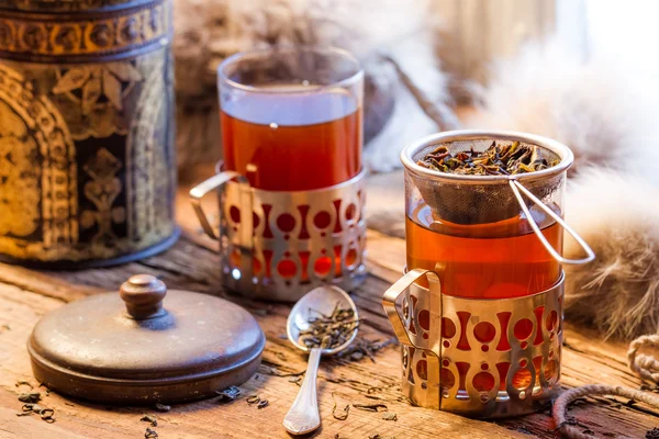 Hot tea brewed in the old style — Stock Photo, Image