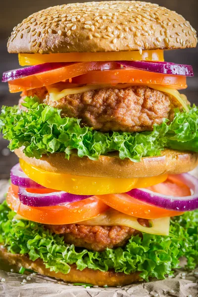 Closeup of tasty homemade big hamburger — Stock Photo, Image