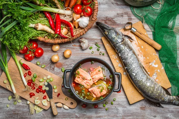 Pike and fresh vegetables for soup of fish — Stock Photo, Image