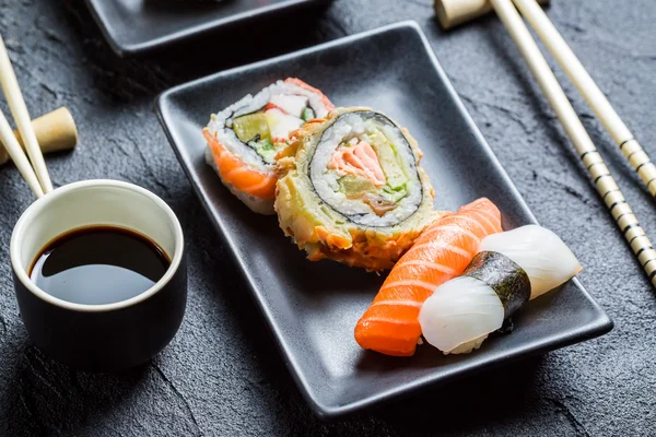 Close up of fresh sushi with soy sauce — Stock Photo, Image