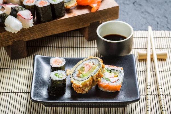 Fresh sushi served with soy sauce — Stock Photo, Image