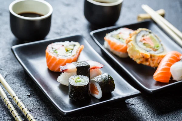 Sushi served with soy sauce for two — Stock Photo, Image