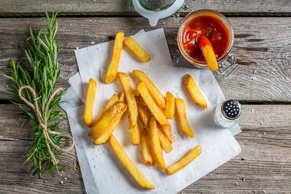 Fresh french fries served with ketchup — Stock Photo, Image