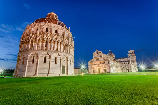 Ancient monuments in Pisa at sunset — Stock Photo, Image