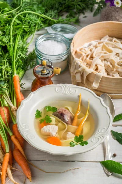 Homemade broth with noodles — Stock Photo, Image