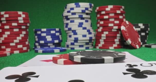 Poker table with cards and chips. Texas holdem for four. — Stock Video