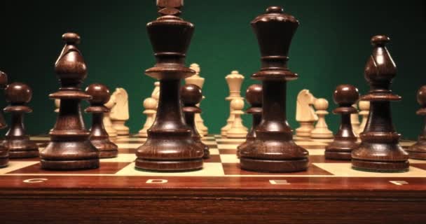 Chess game with black and chess pieces. Parallax effect. — Stock Video