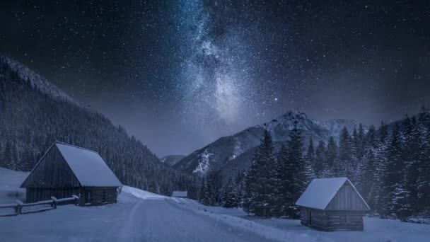Milky way over snowy Chocholowska valley in Tatra Mountains — Stock Video