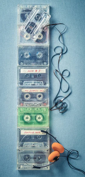 Vintage Transparent Audio Cassettes Orange Headphones Blue Sofa — Stock Photo, Image