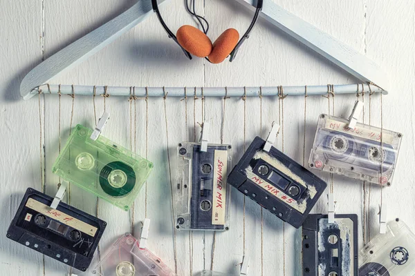 Retro Audio Cassette Hanging Clothes Hanger White Background — Stock Photo, Image