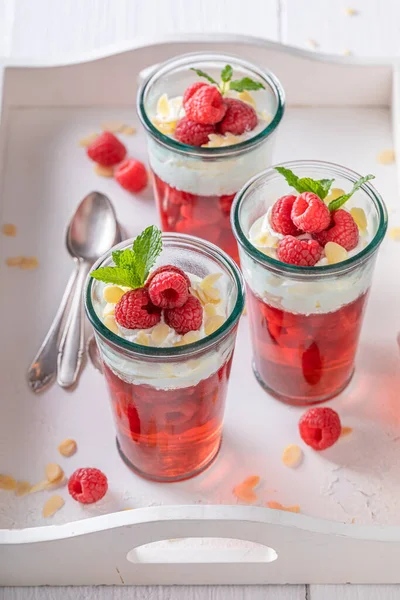 Sweet Red Jelly Served Glass Raspberries Raspberries Jelly Whipped Cream — Stock Photo, Image