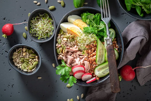 Fit Nicoise salad in the fit version with groats. Healthy bowls on a diet.