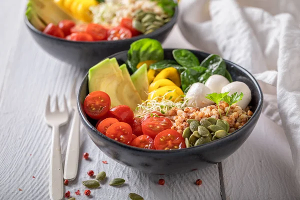 Colorful salad in the fit version with buckwheat groats. Nutritious bowl for fit people.