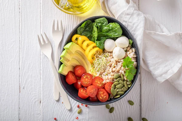 Fresh salad as a balanced meal for diet. Healthy bowls on a diet.