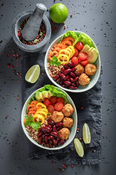 Spicy Mexican salad as meal for people on diet. Nutritious bowl for fit people.