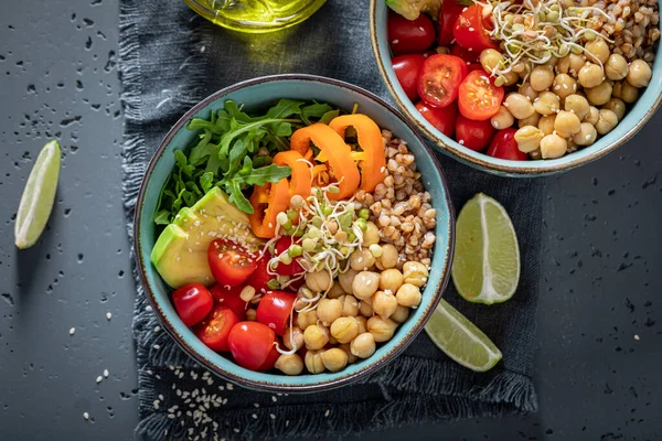 Fit salad with chickpeas, avocado, pepper and groats. Healthy bowls for fit people.