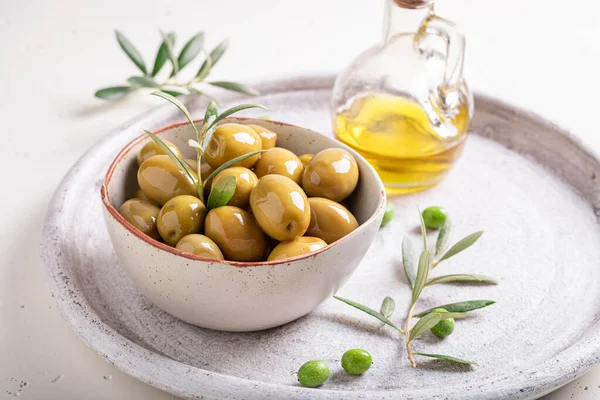 Tasty and healthy olives as a summer snack. Products made of olives.