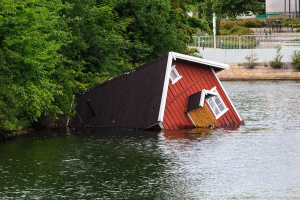 Vmáčknutý dům Stock Obrázky