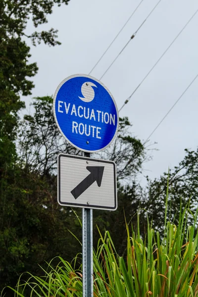 Evacuation route sign Stock Photo
